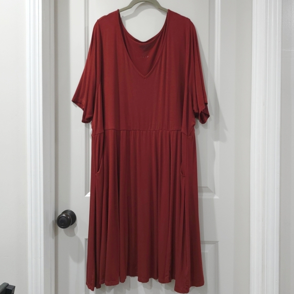 TORRID Short Sleeve Super Soft Knit Mini Skater V-neck Dress, Side Pockets - Picture 3 of 13